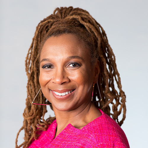 Photo of Kimberlé Crenshaw wearing pink on a white background