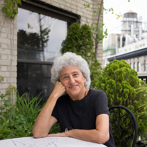 Photo of Marion Nestle with trees in the background